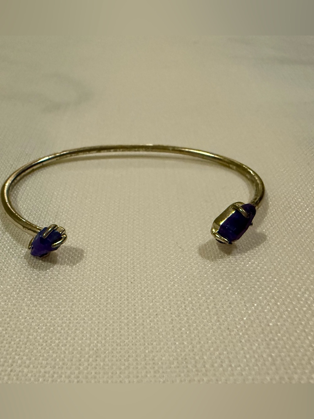 Kendra Scott Gold-Tone Open Cuff with dark blue opal stones